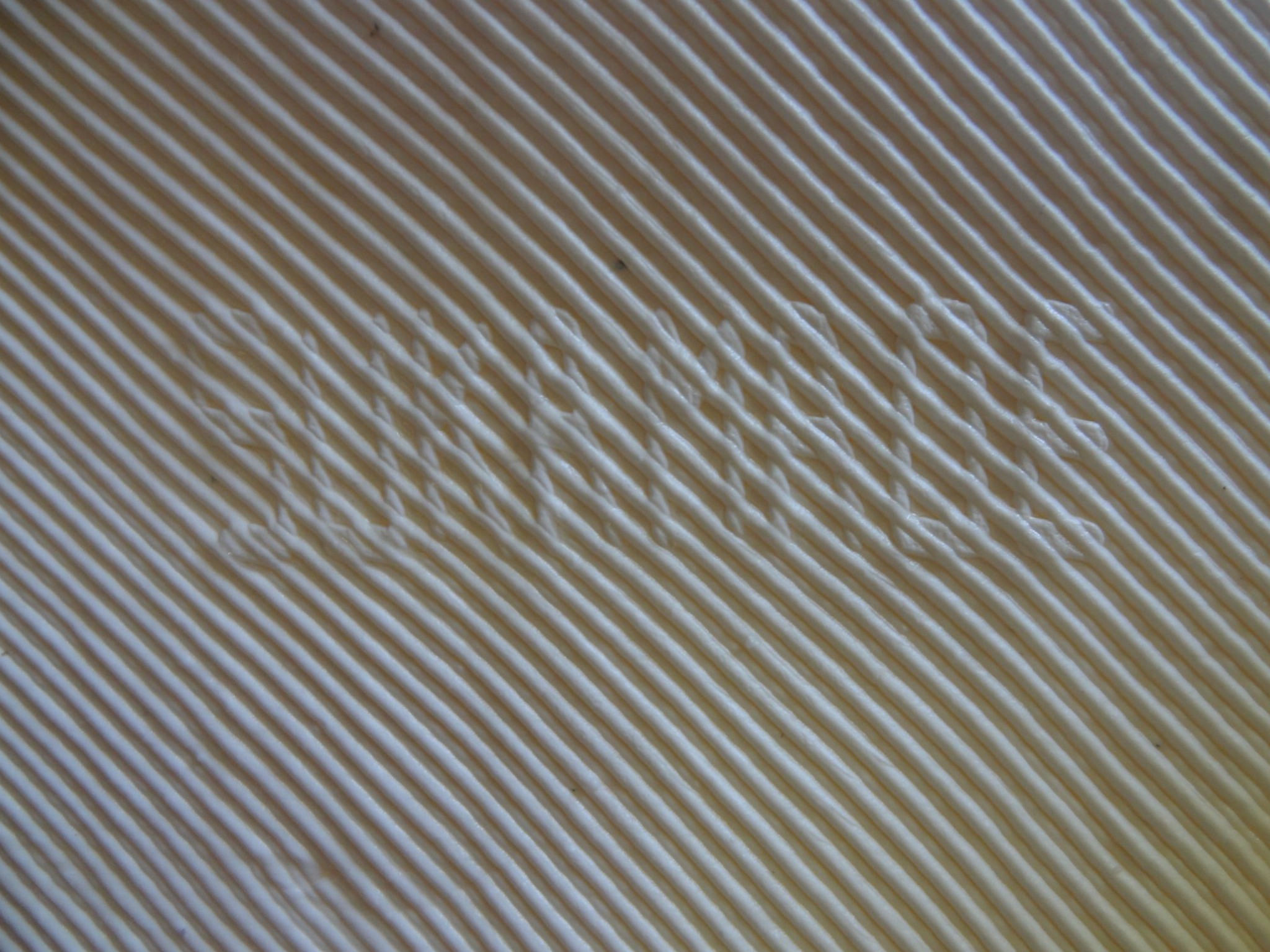 Voorzien van een stempel met de naam van de fabriek